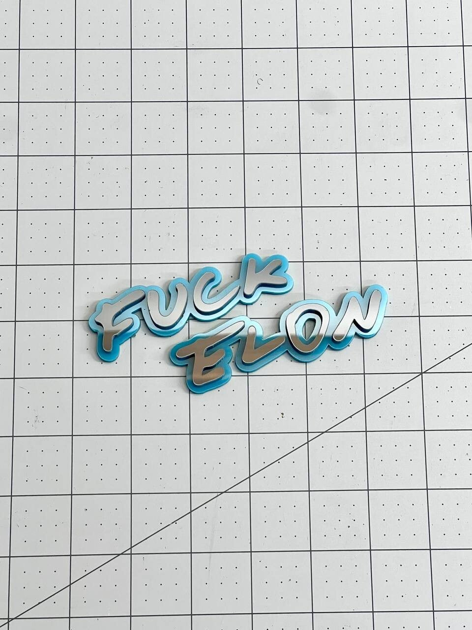 Anti Tesla Anti Elon Musk MULTI COLOR Emblem Badge (1pc)
