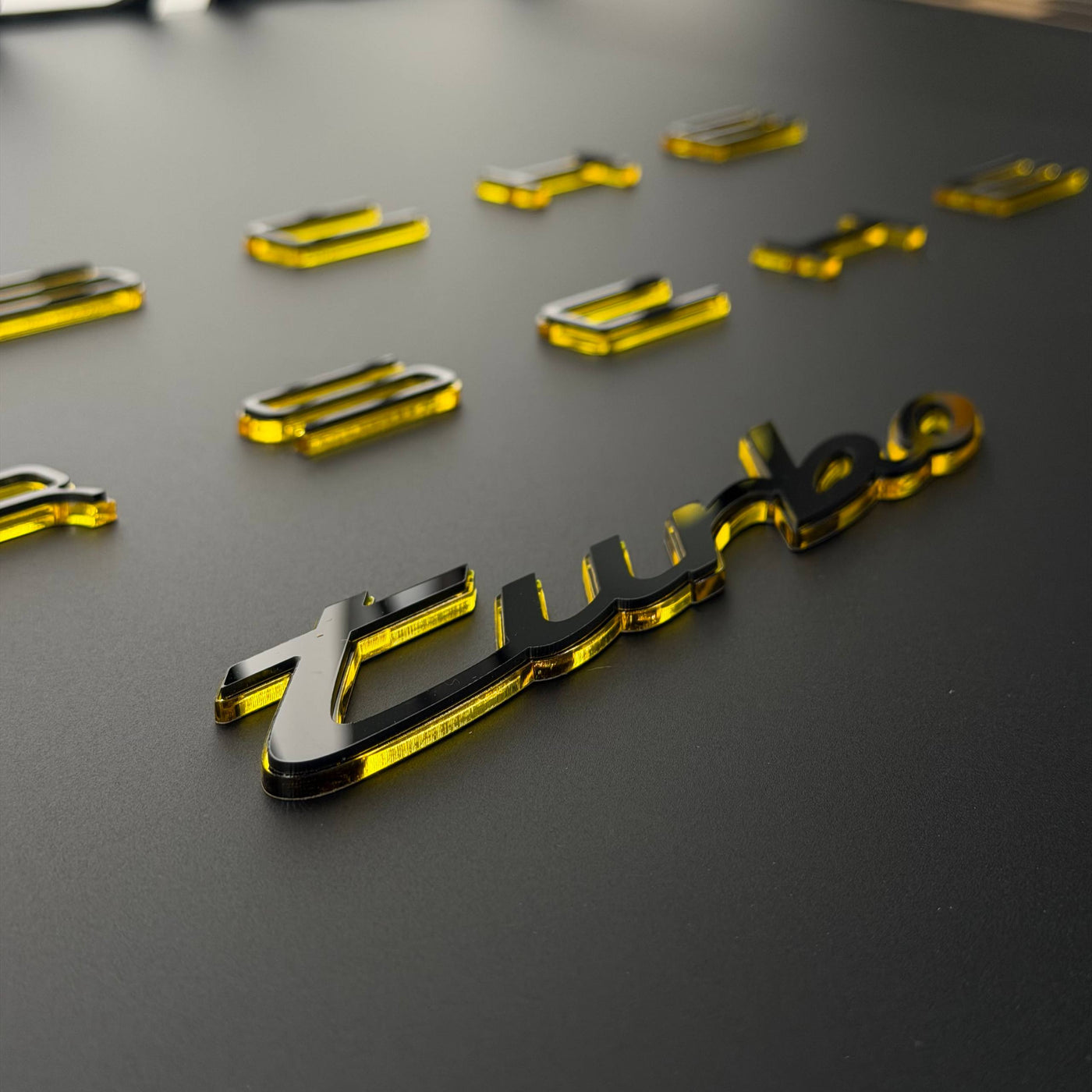 Porsche turbo script emblem cut in mirror acrylic