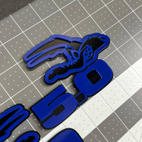 5.0 COYOTE 3D Emblems – Blue on Black Angry Racing Fender Badges (Set of 2)