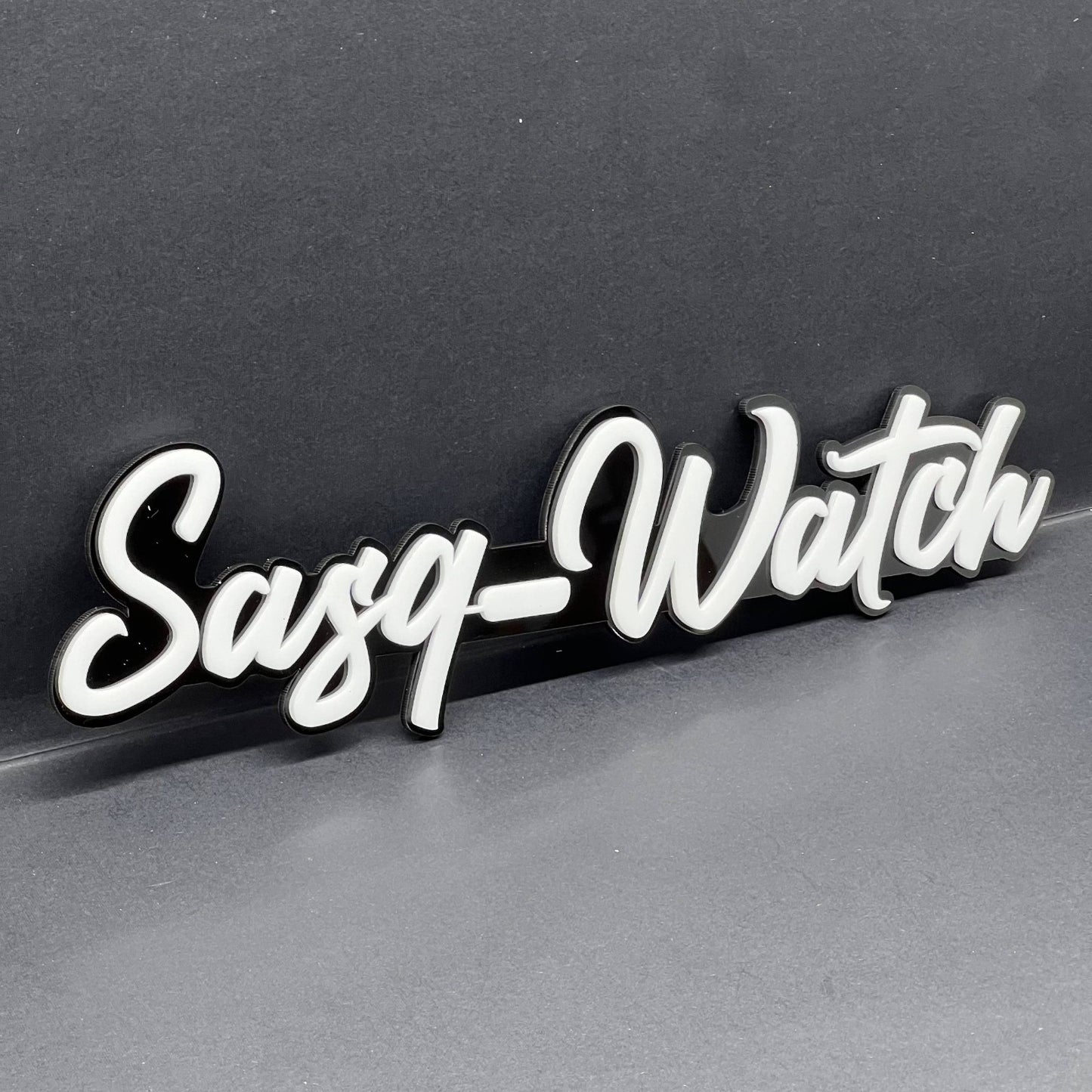 1PCS SASQ-WATCH Emblem – Custom 3D Multicolor Acrylic Car Exterior Badge