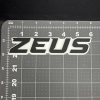 1PC ZEUS 3D Acrylic Emblem – Multicolor Car Badge Decal for Trucks, SUVs, Cars