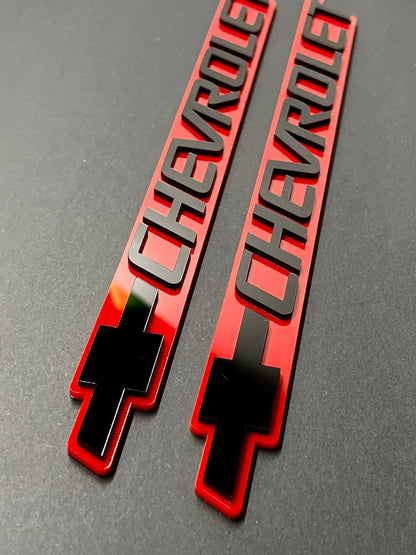2PCS Black CHEVROLET Emblem Badges on Red Background – Aggressive 3D Styling