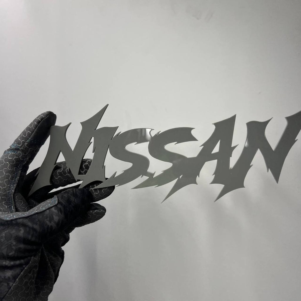 1PC Nissan Emblem – Multicolor Acrylic Car Exterior Fender Tailgate Badge Sticke
