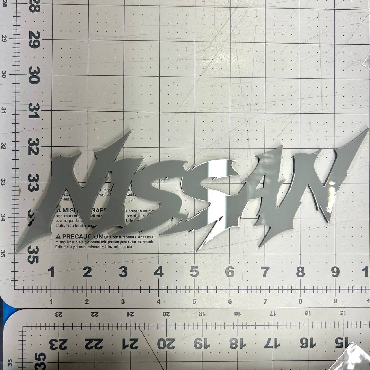 1PC Nissan Emblem – Multicolor Acrylic Car Exterior Fender Tailgate Badge Sticke