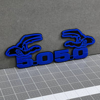5.0 COYOTE 3D Emblems – Blue on Black Angry Racing Fender Badges (Set of 2)