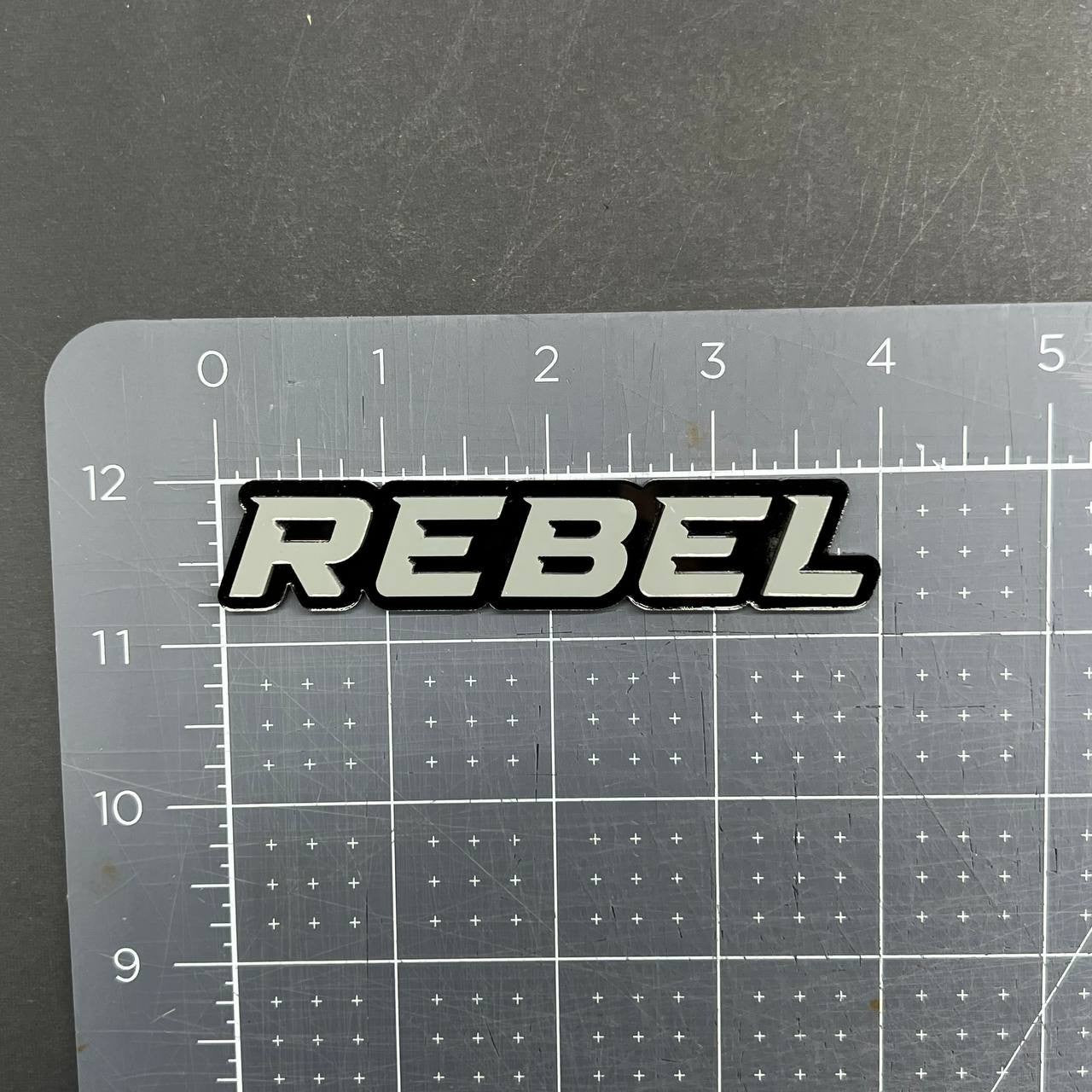 1PC REBEL Emblem Grey – 3D Acrylic Tailgate Badge Decal for Car, Truck, SUV