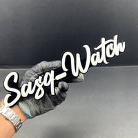 1PCS SASQ-WATCH Emblem – Custom 3D Multicolor Acrylic Car Exterior Badge