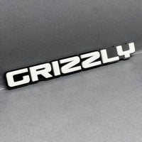 1pc GRIZZLY Multicolor 3D Acrylic Emblem – Aggressive Car & Truck Exterior Badge