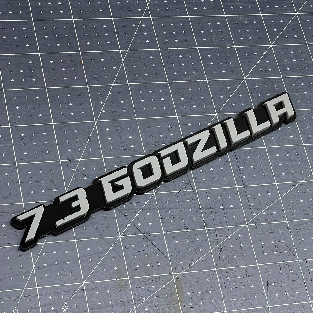 2PCS 7.3L GODZILLA Emblems Grey – 3D Fender Badges for Ford Engine Truck or SUV