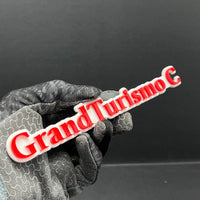 1PC Grand Turismo C Logo Emblem – 3D Multicolor Acrylic Car Fender Trunk Badge