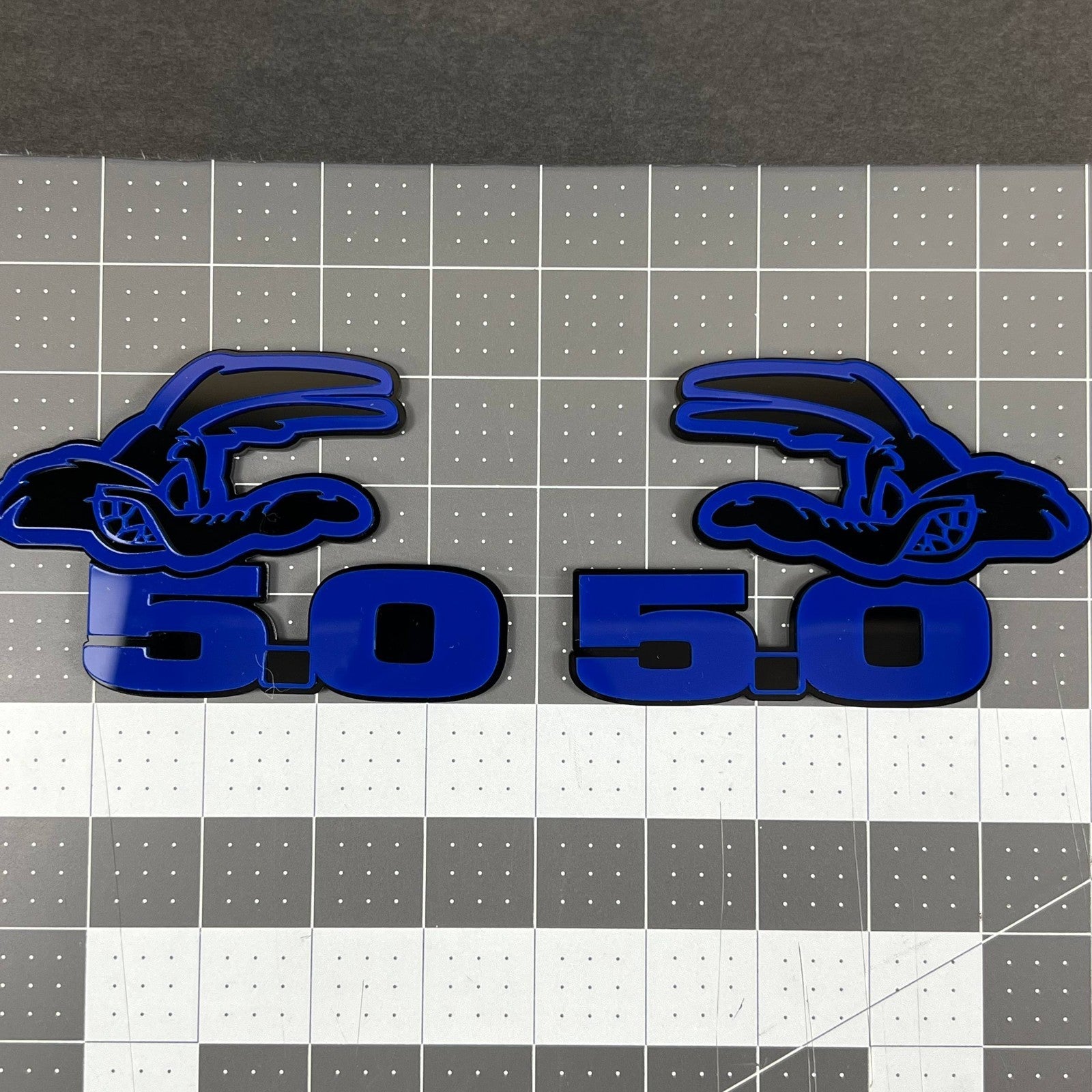 5.0 COYOTE 3D Emblems – Blue on Black Angry Racing Fender Badges (Set of 2)