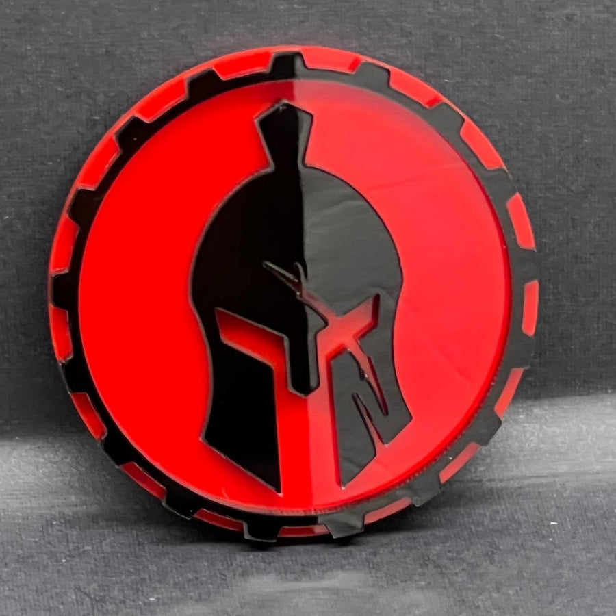 Black and red acrylic emblem, studio shot (hi-res)