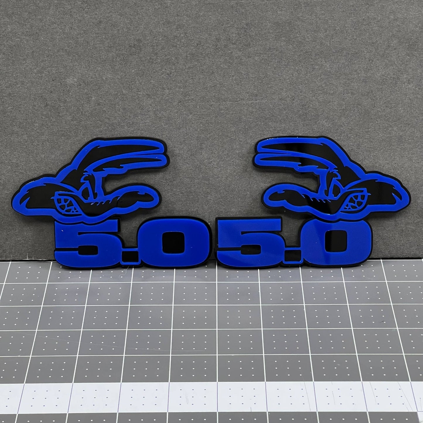 5.0 COYOTE 3D Emblems – Blue on Black Angry Racing Fender Badges (Set of 2)