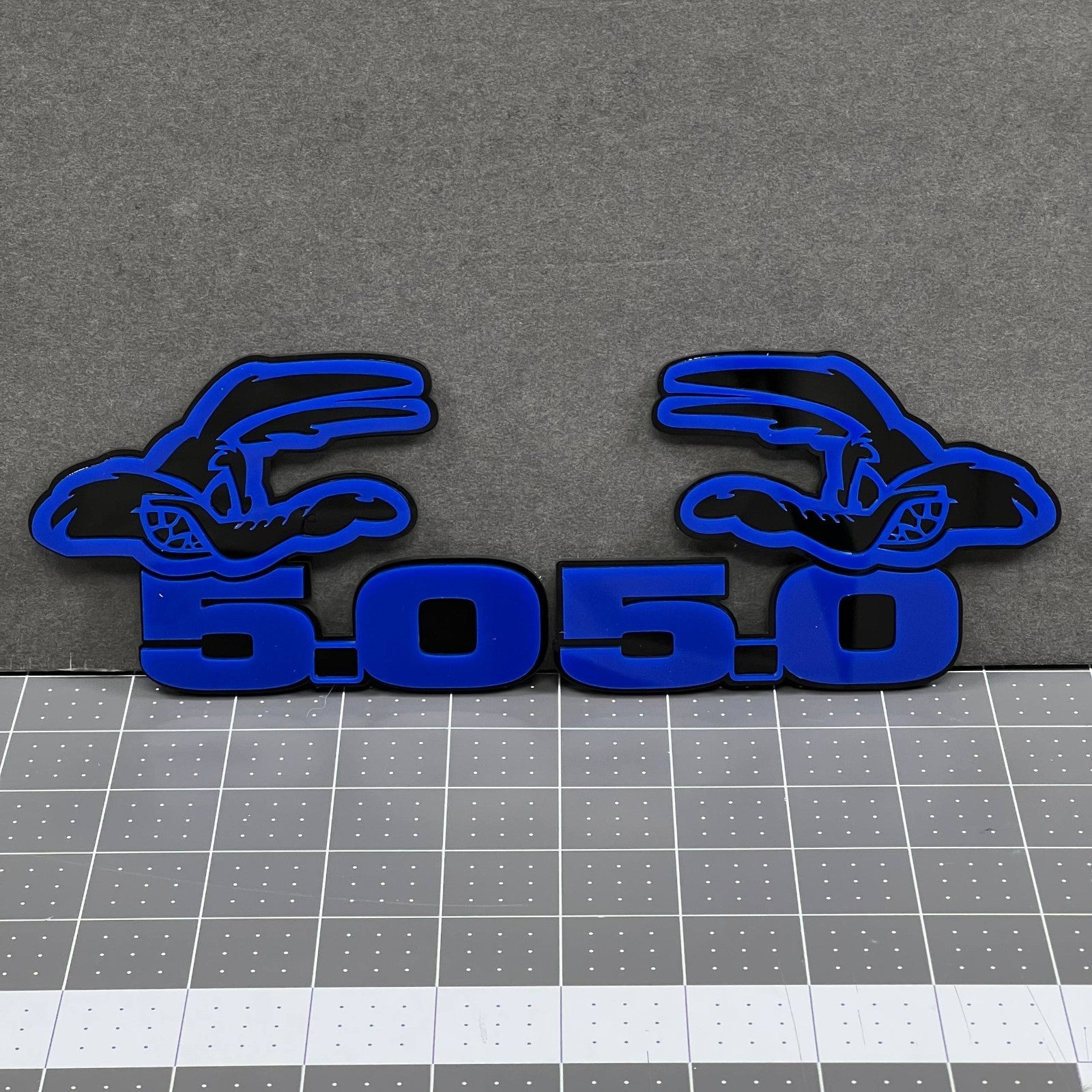 5.0 COYOTE 3D Emblems – Blue on Black Angry Racing Fender Badges (Set of 2)