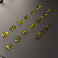 Individual Porsche letters and the turbo script in mirror gold acrylic